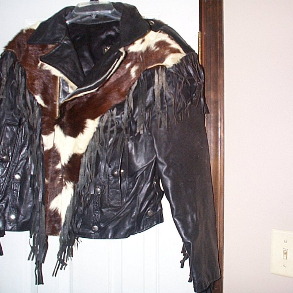 Leather biker jacket with fur and tassels